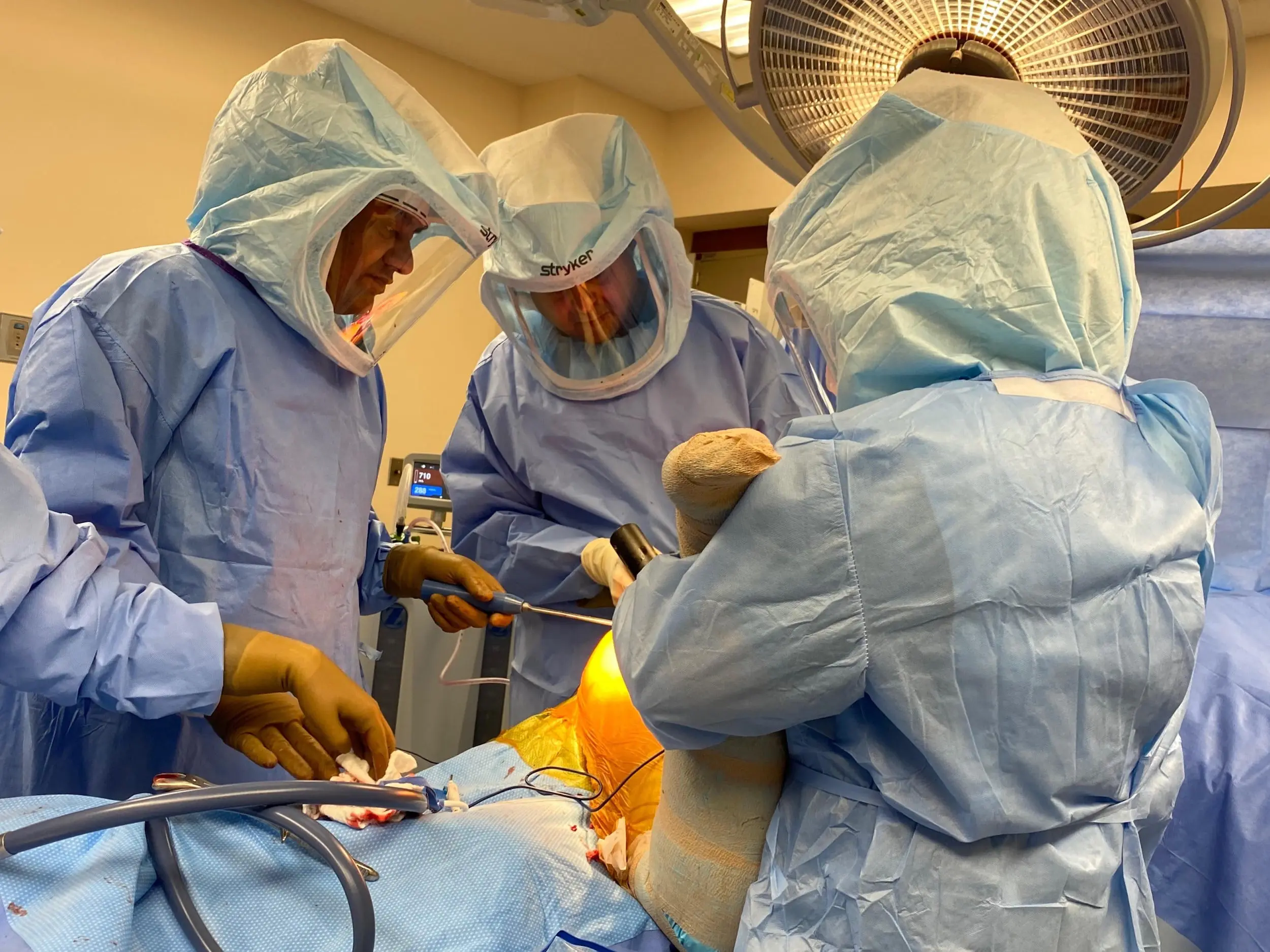 Doctors performing surgery Doctors performing surgery